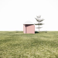 a small pink house in the middle of a grassy field