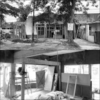 a black and white photo of a building under construction
