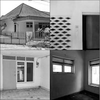 a black and white photo of a house with windows